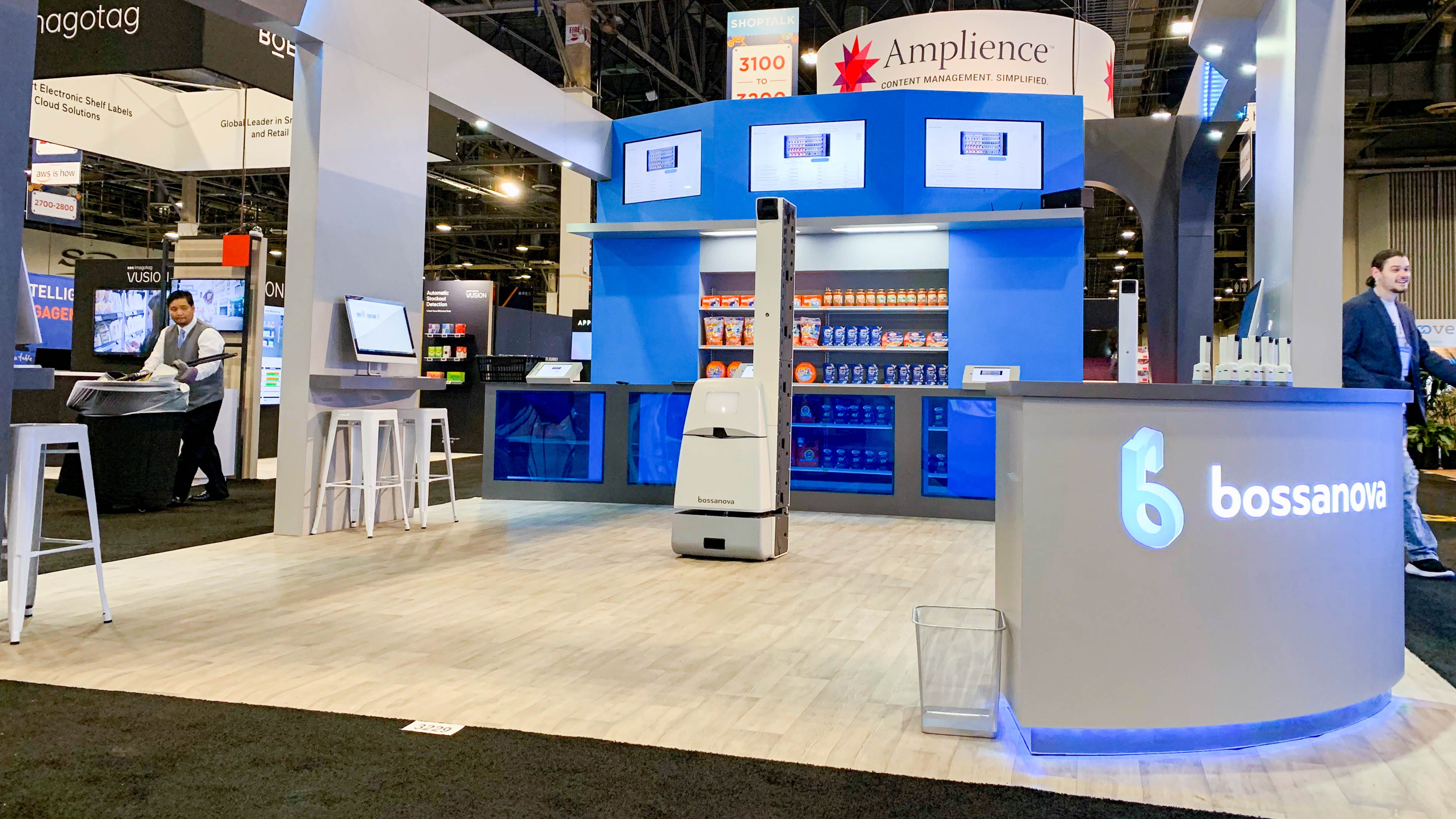 Custom 20 x 20 Island Trade Show Booth design and build by exhibiTeam bossanova