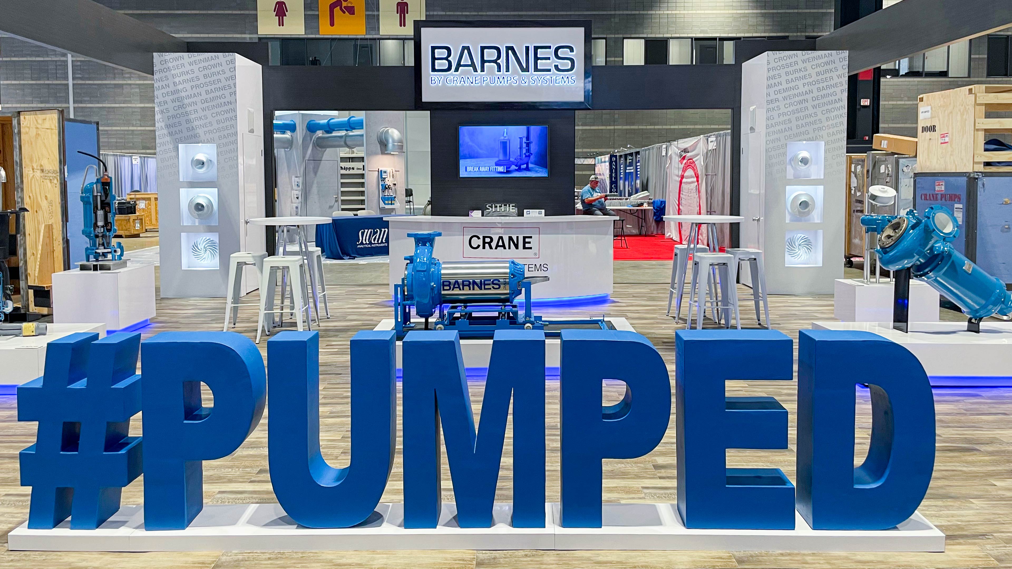 Custom 40 x 60 Island Trade Show Booth design and build by exhibiTeam CRANE PUMPS