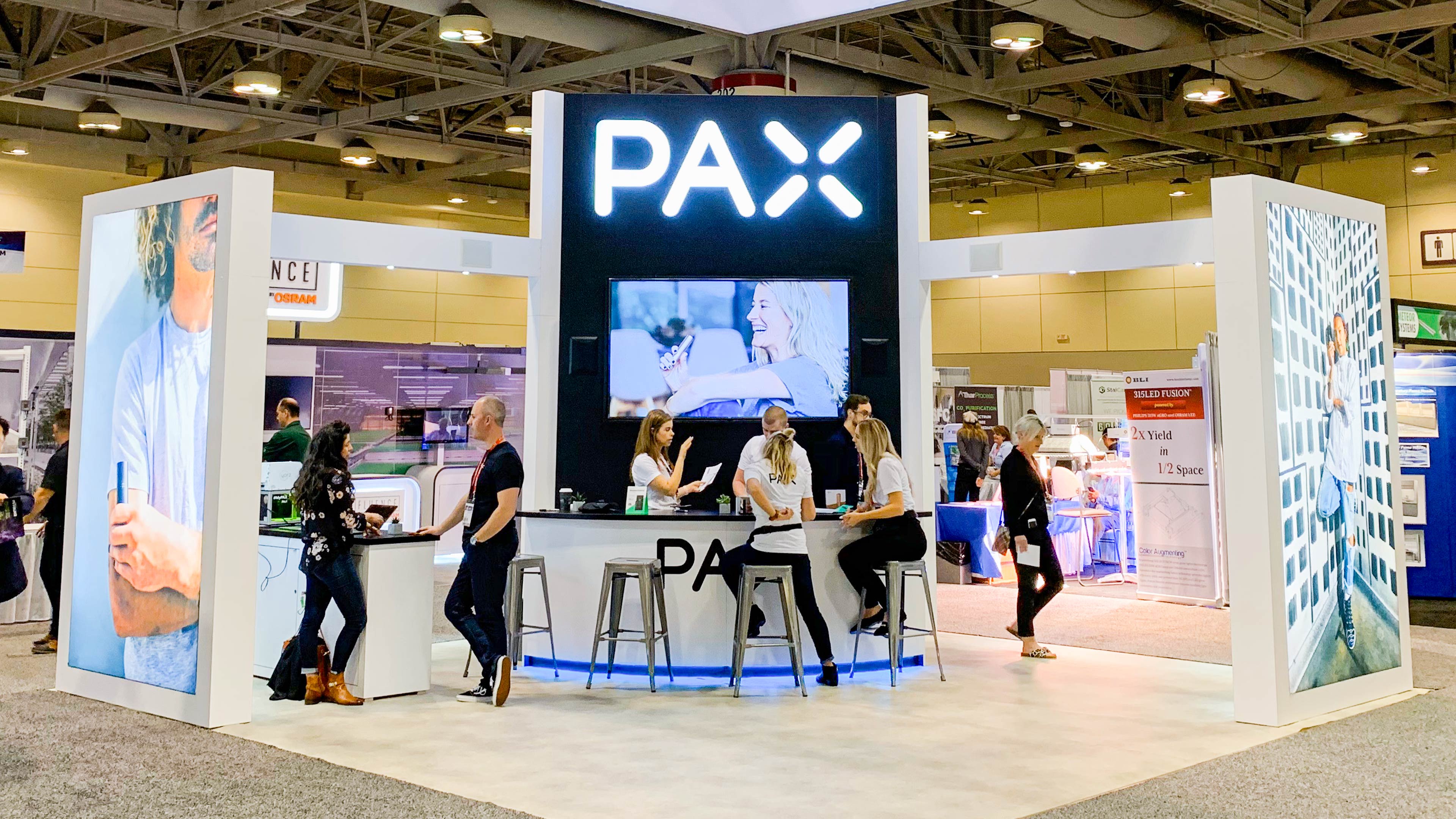 Custom 20 x 20 Island Trade Show Booth design and build by exhibiTeam PAX